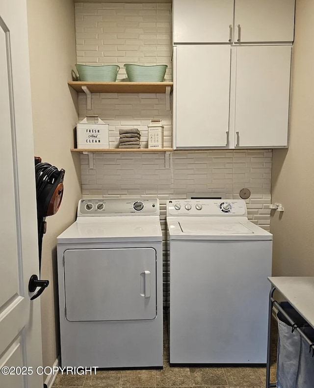 12297 Vista Ridge Loop # 55, Eagle River, AK 99577 - washroom featuring washing machine and clothes dryer and cabinet space