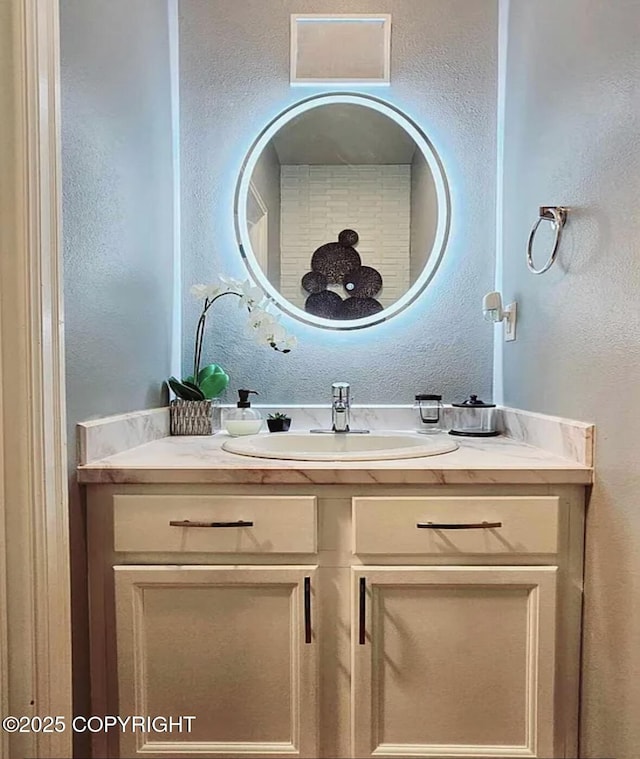 12297 Vista Ridge Loop # 55, Eagle River, AK 99577 - bathroom featuring vanity and a textured wall