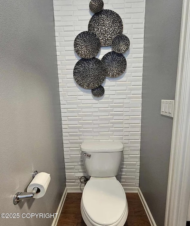 12297 Vista Ridge Loop # 55, Eagle River, AK 99577 - bathroom featuring baseboards and wood finished floors