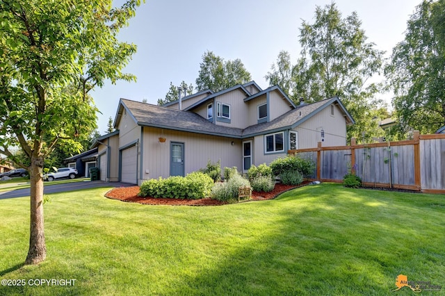 9606 Reliance Dr, Anchorage, AK 99507 - traditional-style house featuring an attached garage, driveway, and a shingled roof