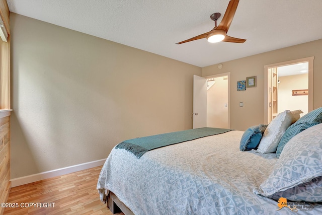 9606 Reliance Dr, Anchorage, AK 99507 - bedroom with light wood-type flooring and a ceiling fan