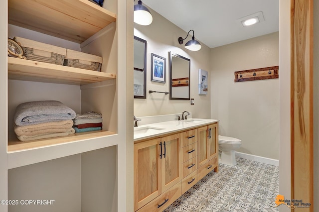 9606 Reliance Dr, Anchorage, AK 99507 - full bath featuring double vanity and toilet
