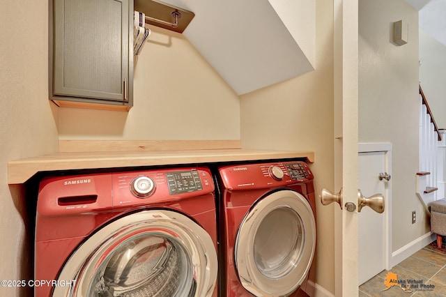 9606 Reliance Dr, Anchorage, AK 99507 - laundry room featuring washing machine and dryer and cabinet space