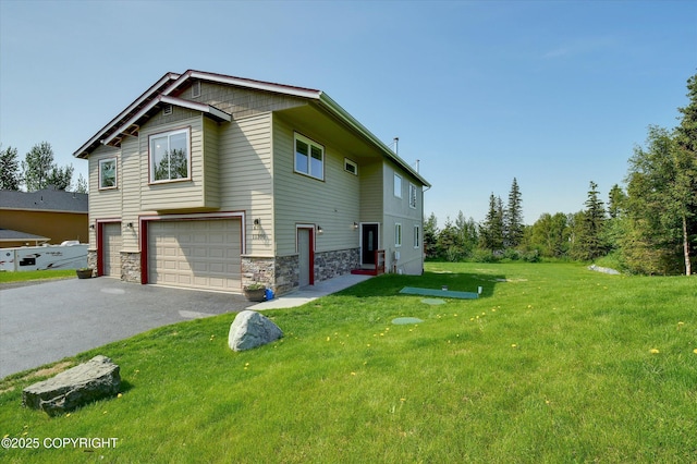 11300 Browder Ave, Anchorage, AK 99507 - view of front of house with stone siding, an attached garage, driveway, and a front lawn