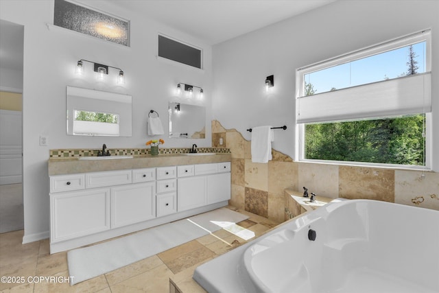 11300 Browder Ave, Anchorage, AK 99507 - bathroom featuring a bath, double vanity, and tile patterned floors