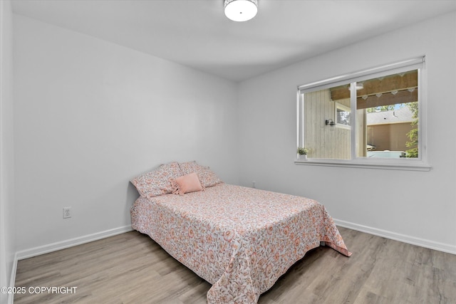 11300 Browder Ave, Anchorage, AK 99507 - bedroom featuring wood finished floors