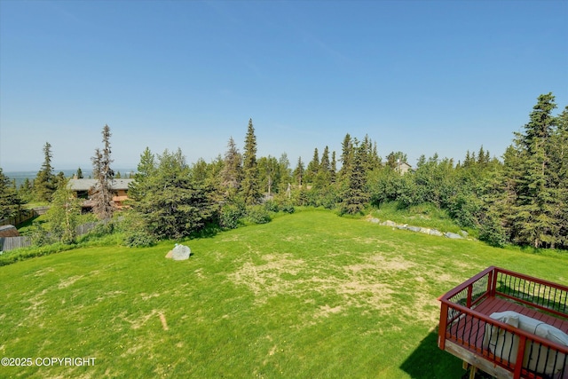 11300 Browder Ave, Anchorage, AK 99507 - view of grassy yard with a wooden deck