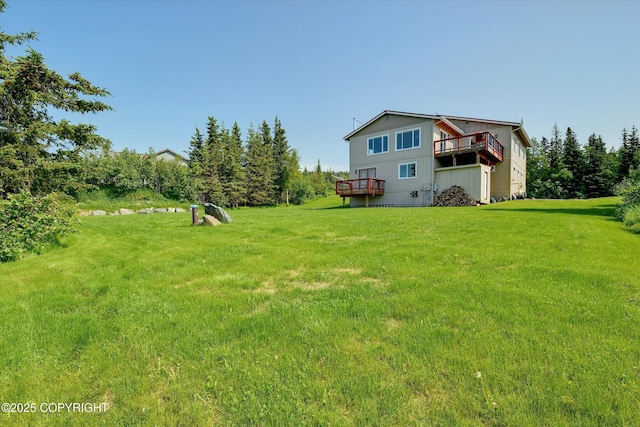 11300 Browder Ave, Anchorage, AK 99507 - view of green lawn with a wooden deck