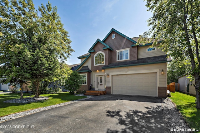 2439 Maritime Loop, Anchorage, AK 99515 - view of front of property featuring driveway and a garage