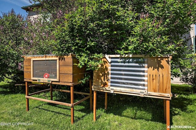 2439 Maritime Loop, Anchorage, AK 99515 - view of poultry coop with a lawn