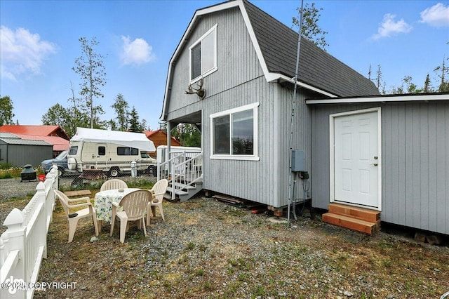 45552 Spruce Ave # 123, Soldotna, AK 99669 - rear view of property with entry steps and a gambrel roof