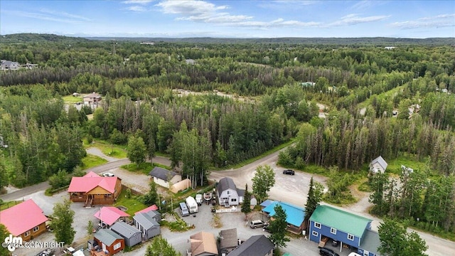 45552 Spruce Ave # 123, Soldotna, AK 99669 - aerial view of residential area with a heavily wooded area
