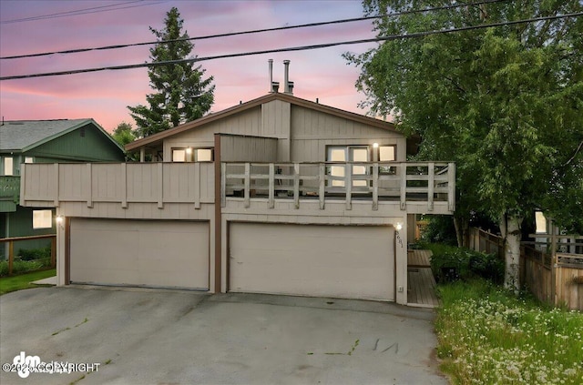 3681 E 20th Ave, Anchorage, AK 99508 - view of front of property with a balcony and a garage
