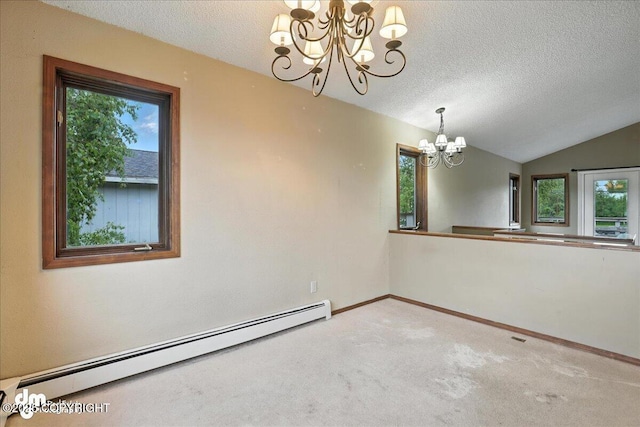 3681 E 20th Ave, Anchorage, AK 99508 - spare room with a chandelier, a baseboard heating unit, healthy amount of natural light, a textured ceiling, and carpet flooring