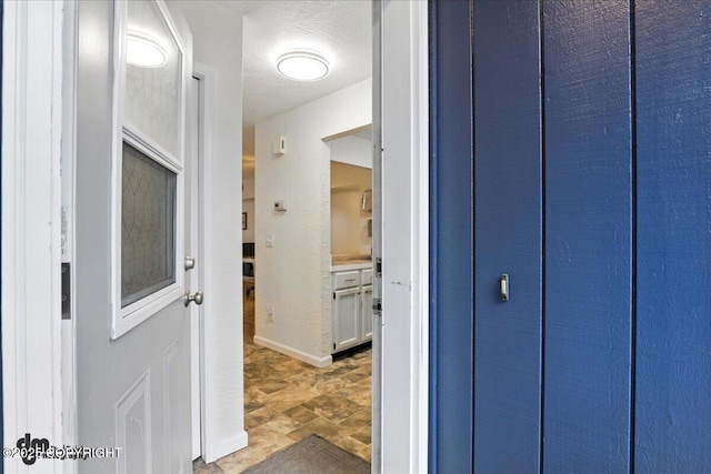 12313 Lake St # C-7, Eagle River, AK 99577 - hallway featuring a textured ceiling