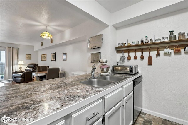 12313 Lake St # C-7, Eagle River, AK 99577 - kitchen featuring stainless steel dishwasher, open floor plan, a textured wall, decorative light fixtures, and dark stone finish floors