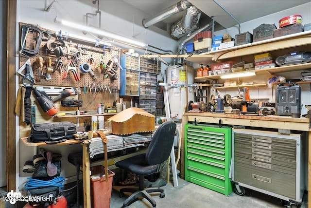 12313 Lake St # C-7, Eagle River, AK 99577 - interior space featuring a workshop area, concrete floors, and water heater