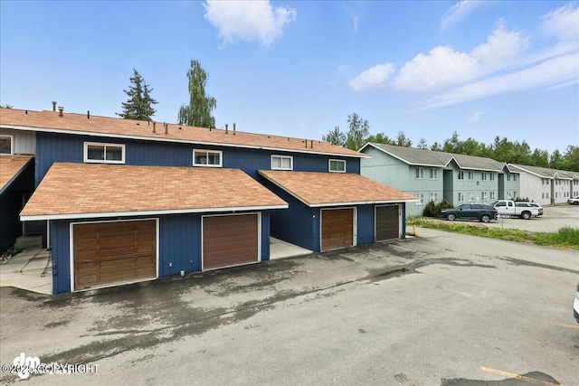 12313 Lake St # C-7, Eagle River, AK 99577 - view of front facade featuring a residential view