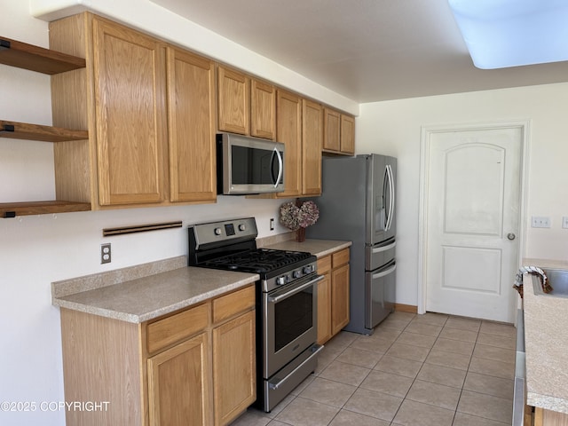 123 Green Valley St, Soldotna, AK 99669 - kitchen featuring stainless steel appliances, open shelves, light tile patterned flooring, and light countertops