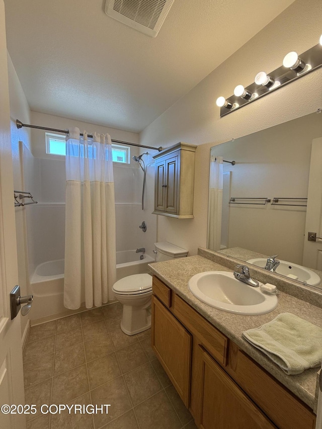 123 Green Valley St, Soldotna, AK 99669 - bathroom with shower / bath combo with shower curtain, vanity, and tile patterned floors