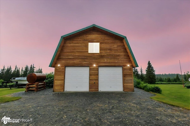 64320 Trail Rd, Anchor Point, AK 99556 - garage at dusk with a garage