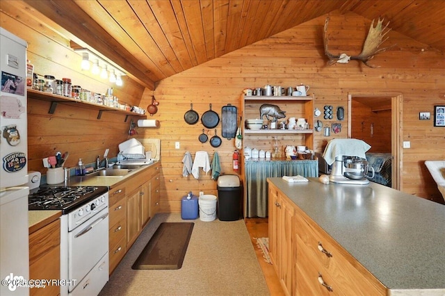 64320 Trail Rd, Anchor Point, AK 99556 - kitchen with vaulted ceiling, white range with gas stovetop, wood walls, open shelves, and wood ceiling