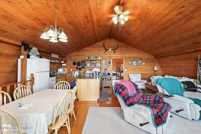 64320 Trail Rd, Anchor Point, AK 99556 - dining area featuring wooden walls, vaulted ceiling, wooden ceiling, light wood-type flooring, and ceiling fan