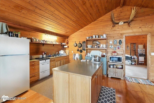 64320 Trail Rd, Anchor Point, AK 99556 - kitchen featuring white appliances, vaulted ceiling, open shelves, wooden walls, and wood ceiling