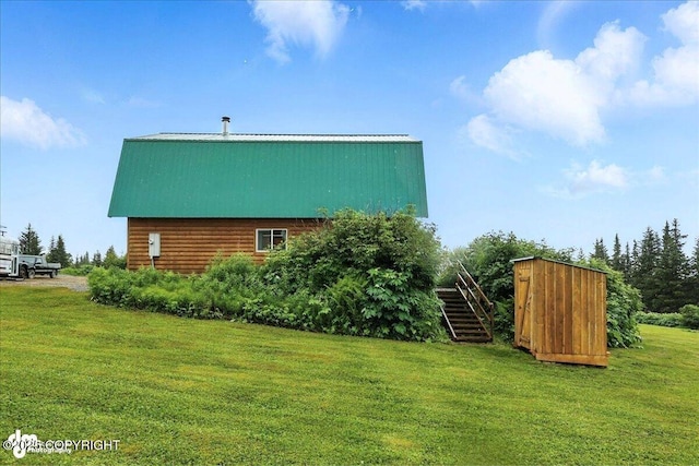 64320 Trail Rd, Anchor Point, AK 99556 - view of grassy yard featuring stairs