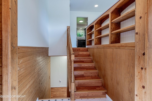 312 W Riverview Ave, Soldotna, AK 99669 - stairs featuring a wainscoted wall and wooden walls