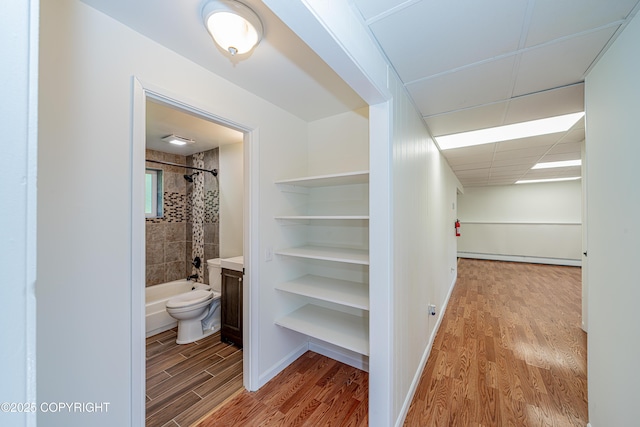 312 W Riverview Ave, Soldotna, AK 99669 - spacious closet featuring light wood finished floors and baseboard heating
