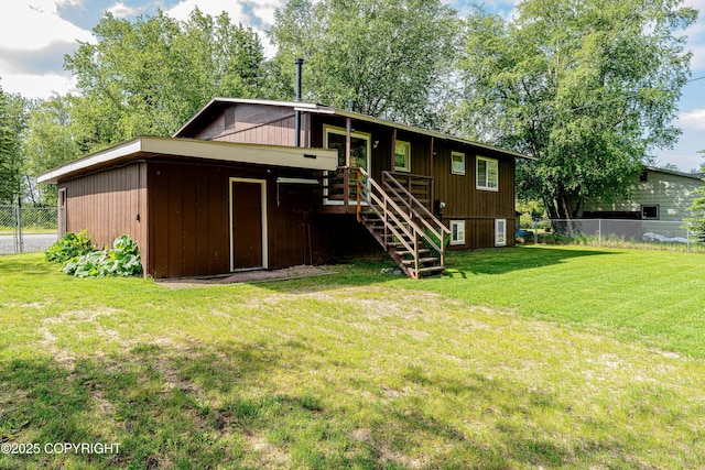 312 W Riverview Ave, Soldotna, AK 99669 - rear view of property featuring stairs and a wooden deck