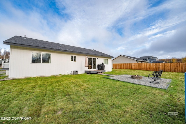 1302 E Esty Dr, Palmer, AK 99645 - rear view of property featuring a fire pit