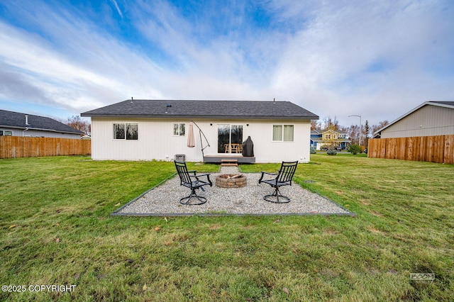 1302 E Esty Dr, Palmer, AK 99645 - rear view of property with a fire pit and a patio area
