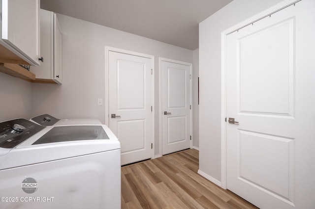 1302 E Esty Dr, Palmer, AK 99645 - laundry room with cabinet space, washer and dryer, and light wood-type flooring