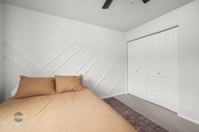 1302 E Esty Dr, Palmer, AK 99645 - carpeted bedroom with a decorative wall, a closet, and a ceiling fan