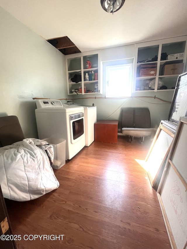 4002 Barbara Dr, Anchorage, AK 99517 - kitchen featuring washing machine and dryer and wood finished floors