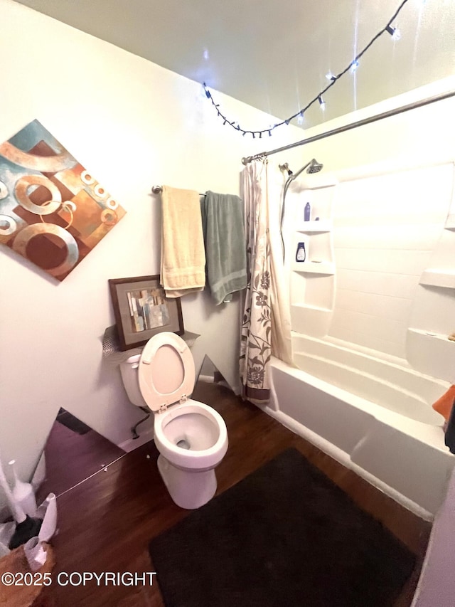4002 Barbara Dr, Anchorage, AK 99517 - bathroom with wood finished floors and shower / bath combination with curtain