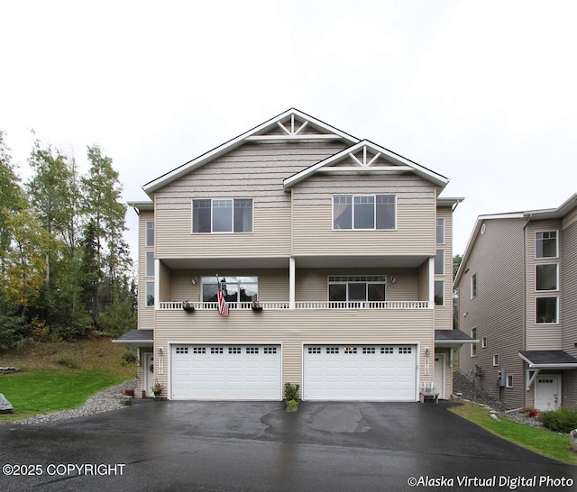 20103 Riverside Dr # 1B, Eagle River, AK 99577 - view of front facade with driveway and a garage