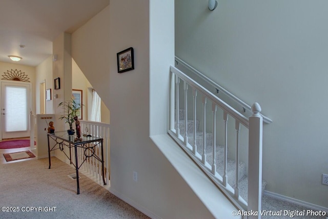 20103 Riverside Dr # 1B, Eagle River, AK 99577 - stairway with carpet flooring and baseboards