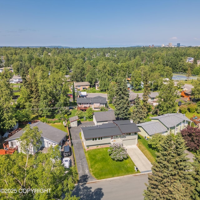 2831 Bennett Ave, Anchorage, AK 99517 - aerial perspective of suburban area featuring a forest