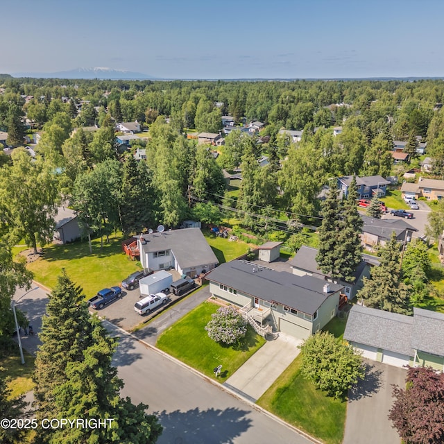 2831 Bennett Ave, Anchorage, AK 99517 - aerial view of residential area featuring a heavily wooded area