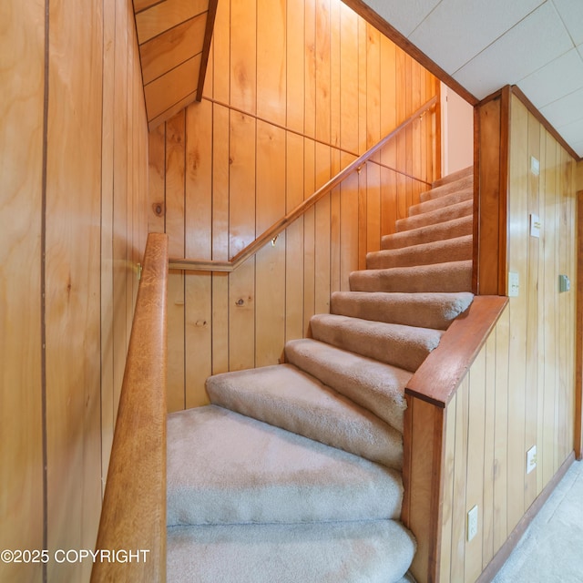 2831 Bennett Ave, Anchorage, AK 99517 - stairs featuring wood walls and carpet