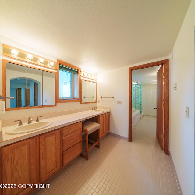 2831 Bennett Ave, Anchorage, AK 99517 - full bathroom featuring double vanity and tile patterned flooring