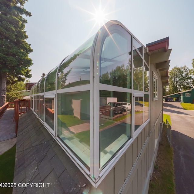 2831 Bennett Ave, Anchorage, AK 99517 - view of side of home with board and batten siding