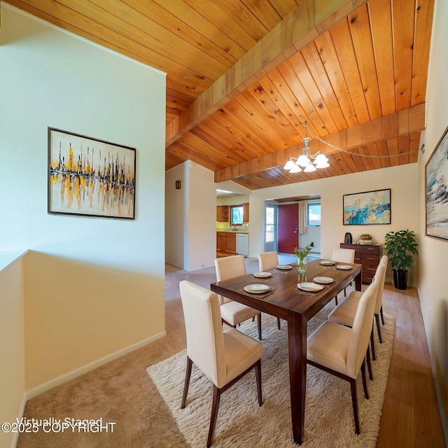 2831 Bennett Ave, Anchorage, AK 99517 - dining area with a chandelier, a wooden ceiling with exposed beams, and light carpet
