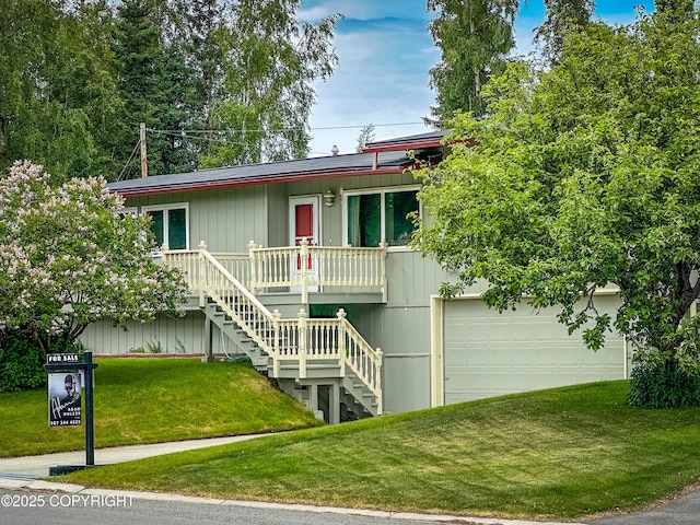 2831 Bennett Ave, Anchorage, AK 99517 - view of front of house featuring stairway, a front yard, and a porch