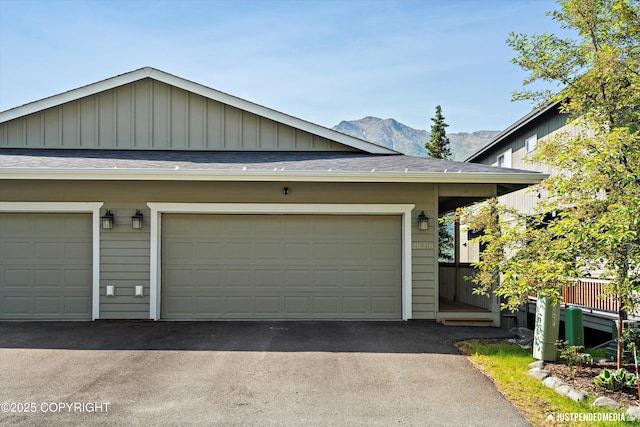 20218 Eagles Nest Ct, Eagle River, AK 99577 - garage with a mountain view