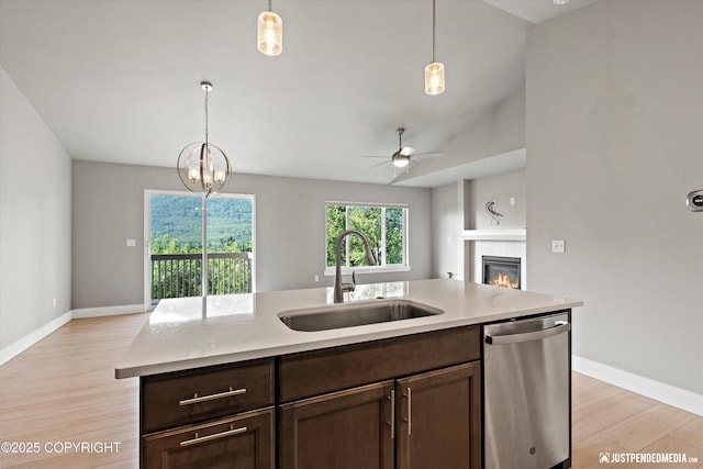 20218 Eagles Nest Ct, Eagle River, AK 99577 - kitchen with dishwasher, open floor plan, light wood-type flooring, and light countertops