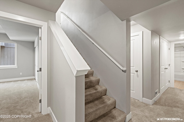 20218 Eagles Nest Ct, Eagle River, AK 99577 - staircase featuring carpet flooring